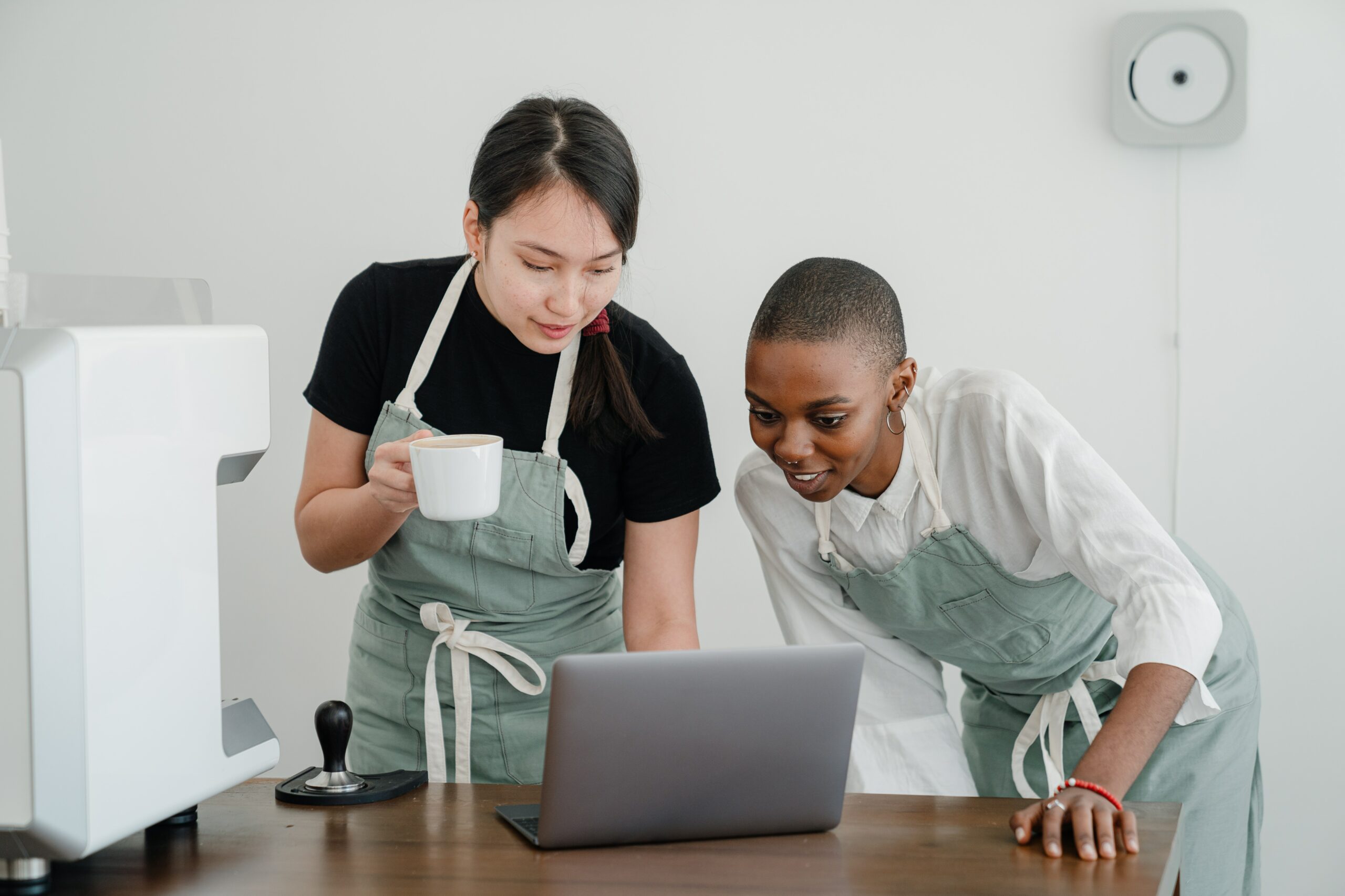 baristas-looking-at-laptop