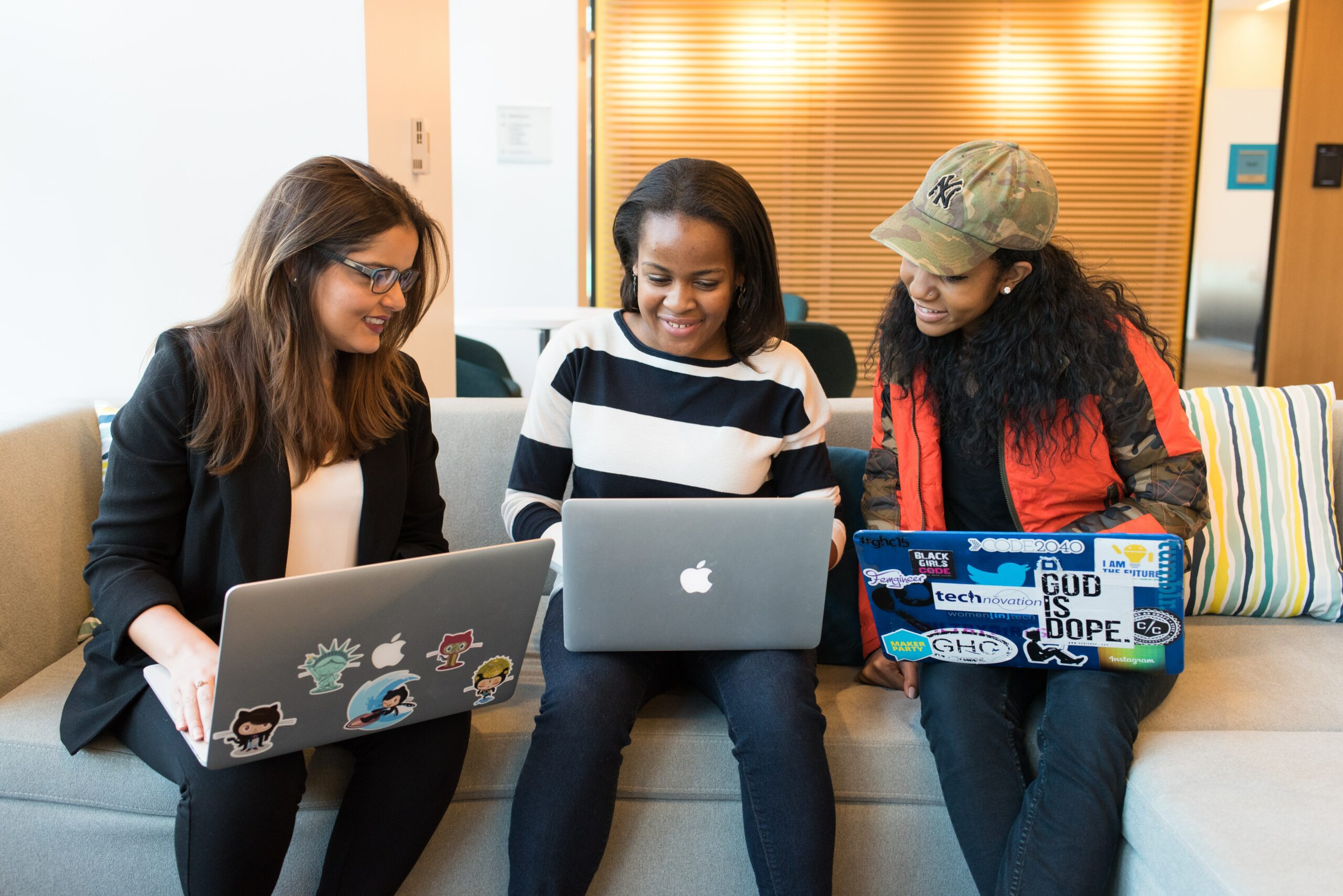 women-on-laptops