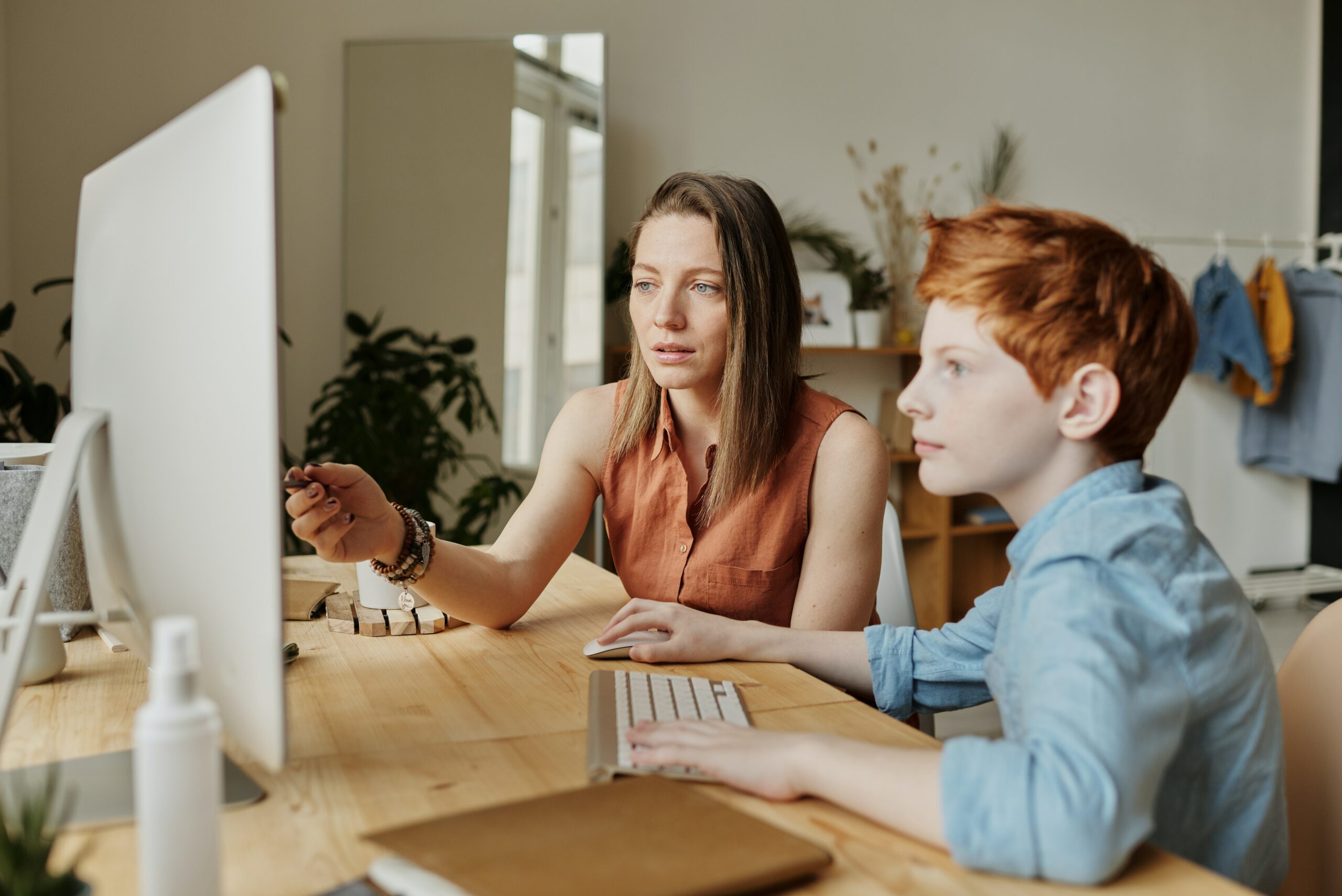 mother-and-son-in-front-of-laptop